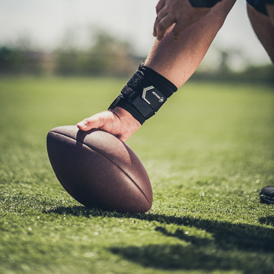 Athlete doing drills wearing a wrist brace