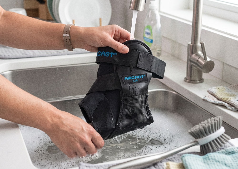 Aircast Airlift PTTD Brace being washed in a kitchen sink