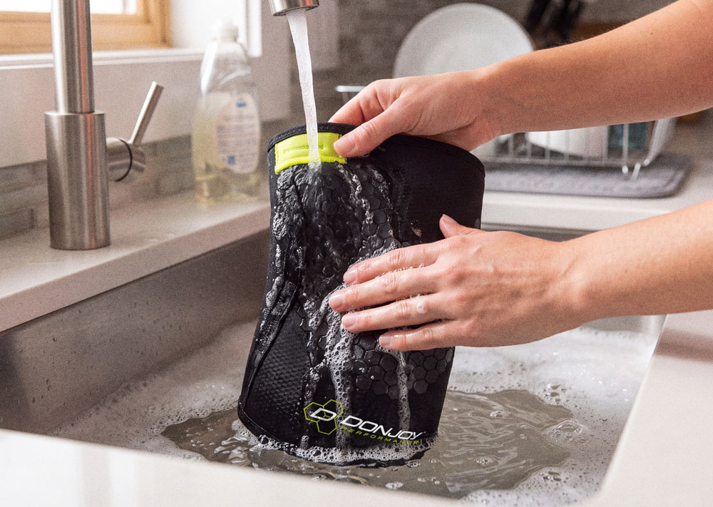 DonJoy Performance Anaform 5MM Knee Sleeve being washed in a kitchen sink