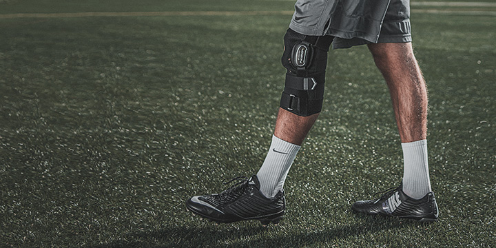 athlete wearing knee brace