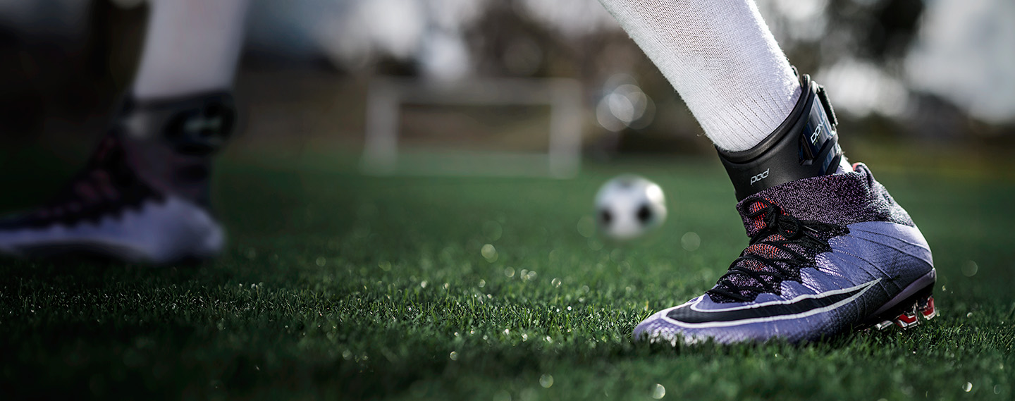 Athlete wearing the DonJoy Performance POD ankle Brace playing soccer
